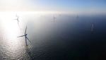 Image of wind turbines on the ocean.